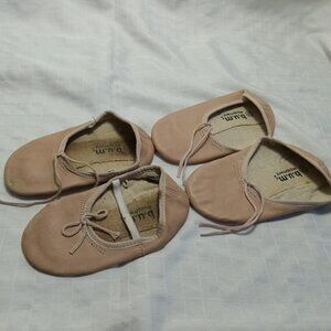 Three pairs of dance slippers: one in leather (1977) two in fabric (2005)